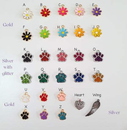 Choose from a variety of charms to adorn your keepsake.