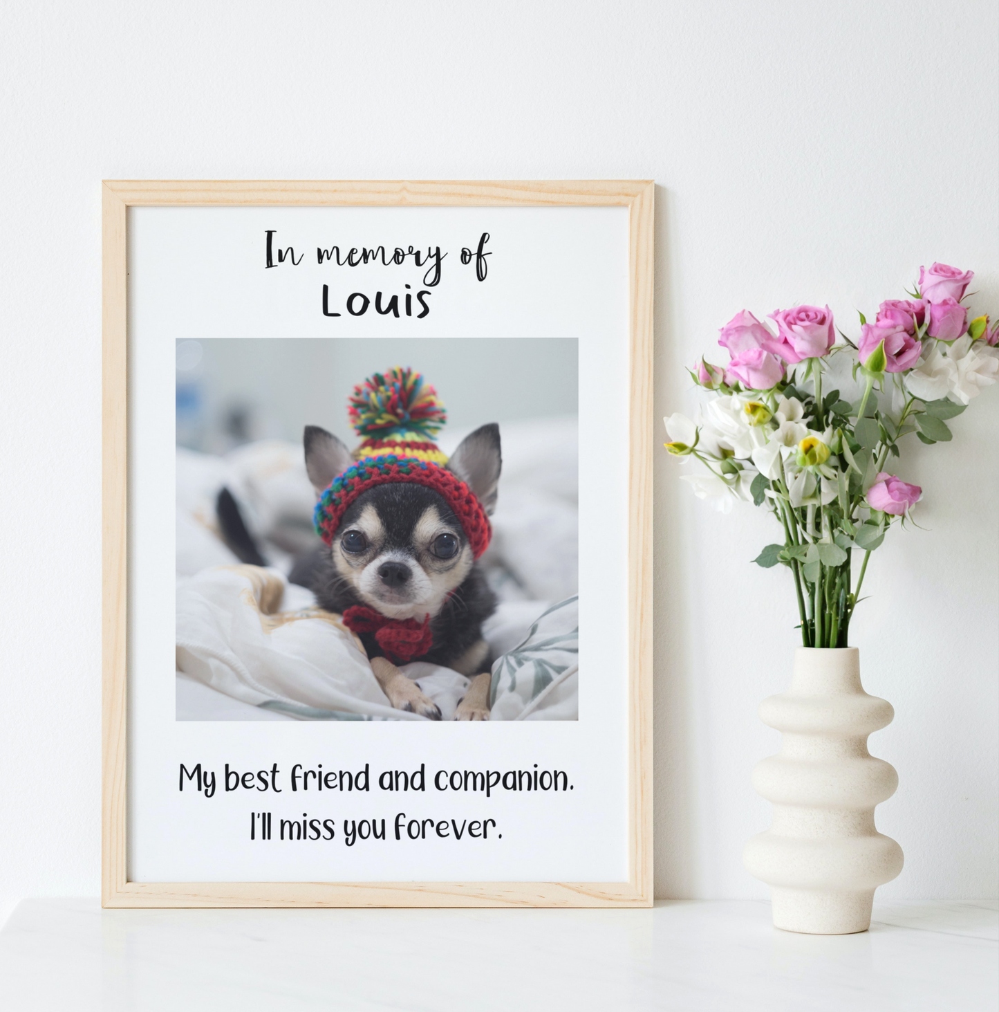 The poster has a customisable photo and message for your beloved pet. The text at the  top reads, “In loving memory,” with space for your pet’s name. The photo is centred in the middle, with custom text at the bottom.